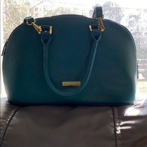 Joy & Iman turquoise purse